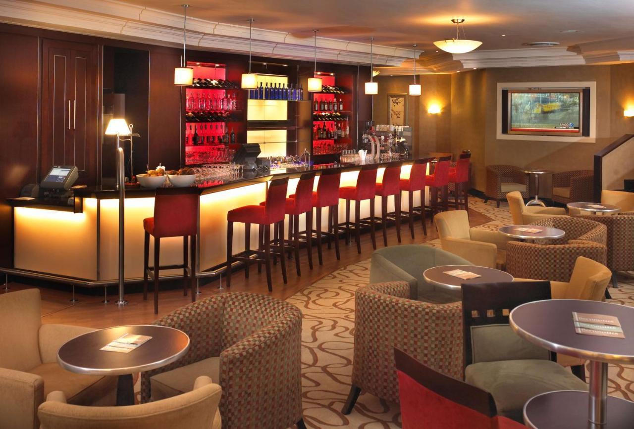 Southern Sun Or Tambo International Airport Kempton Park Dış mekan fotoğraf Bar